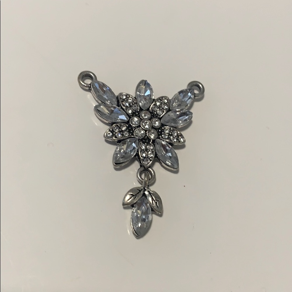 Antique silver charm with rhinestones